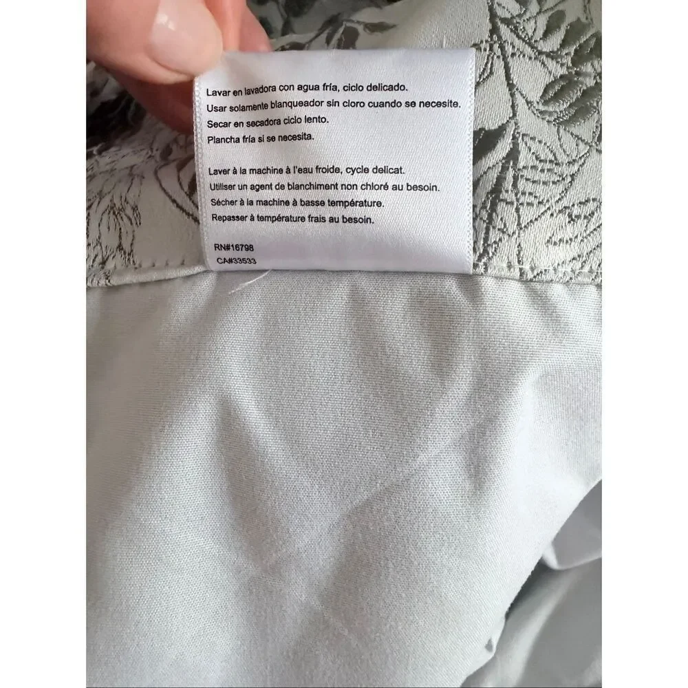 Scott Living Aubry Shimmering Floral 100% Blackout Back Tab Curtain Panel 96x51